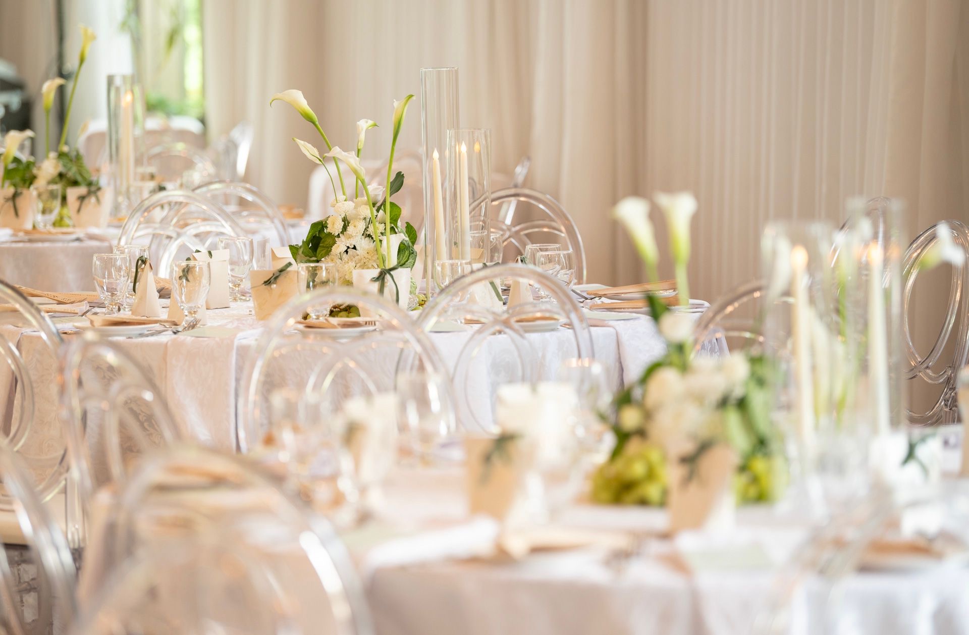Elegant event table setting with candles and florals